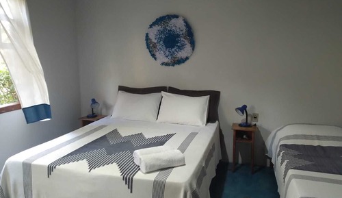Chambre Triple Classique, plusieurs lits, vue jardin, côté jardin