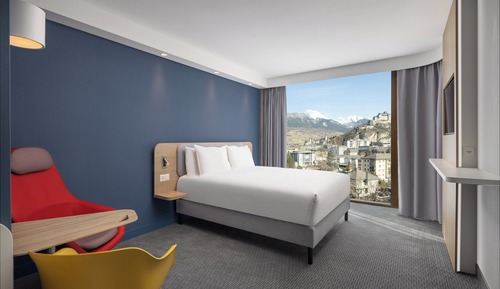 Suite, 1 grand lit et 1 canapé-lit
