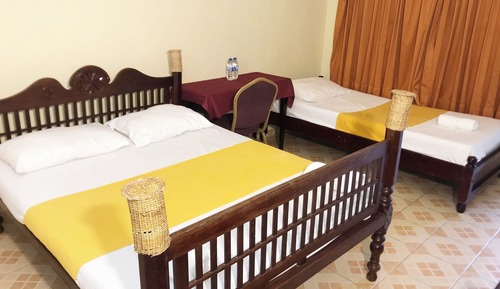 Chambre Triple Standard, vue piscine