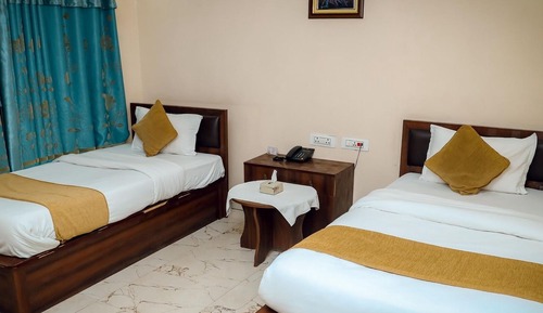 Chambre Deluxe Double ou avec lits jumeaux, 2 lits une place, vue jardin