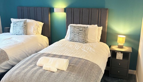 Chambre Supérieure avec lits jumeaux, 2 lits une place, salle de bains privée