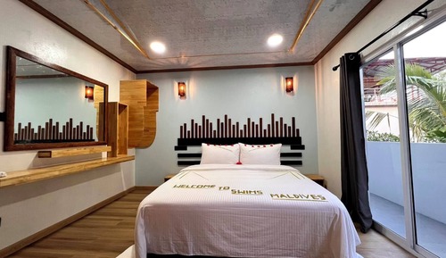 Chambre Deluxe Double ou avec lits jumeaux, balcon, vue jardin