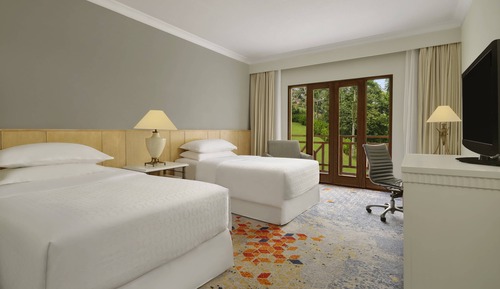 Chambre Deluxe avec lits jumeaux, balcon, vue jardin