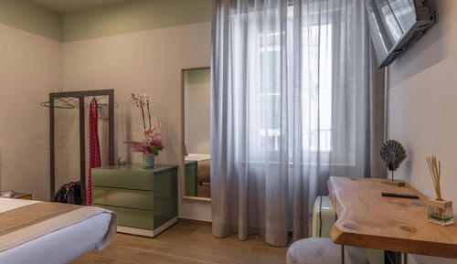 Chambre Deluxe Double ou avec lits jumeaux, balcon, vue partielle sur la mer