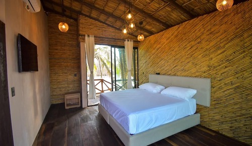 Chambre Familiale avec lits jumeaux, patio, vue plage