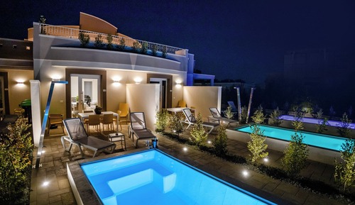 Suite Luxe, patio, vue piscine