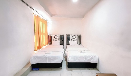 Chambre Deluxe avec lits jumeaux