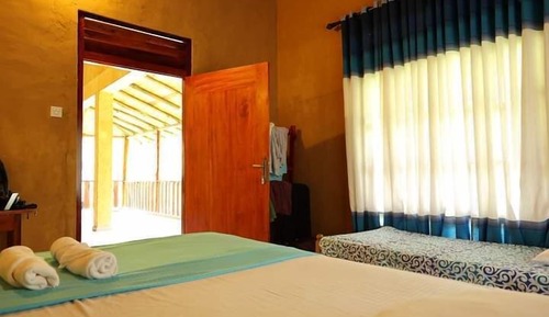Chambre Quadruple Deluxe