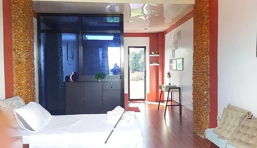 Chambre Deluxe Double ou avec lits jumeaux, balcon, vue océan