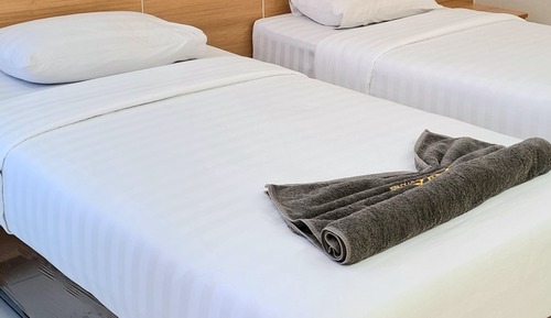 Chambre Deluxe avec lits jumeaux, balcon, vue jardin
