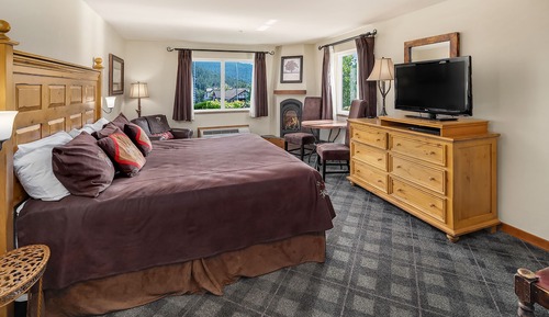 Chambre, 1 très grand lit, accessible aux personnes à mobilité réduite, cheminée