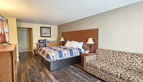 Chambre Deluxe, 1 très grand lit et 1 canapé-lit