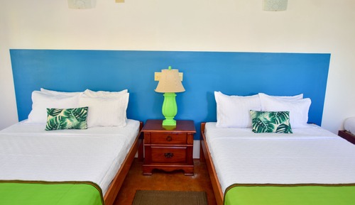 Chambre Familiale, salle de bains privée, en bord de plage