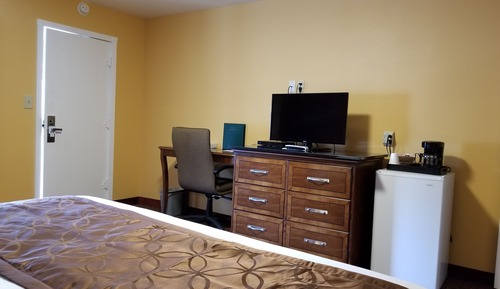 Chambre Deluxe, 1 très grand lit, réfrigérateur et four à micro-ondes