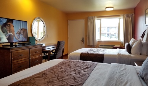 Chambre Deluxe, 2 grands lits, réfrigérateur et four à micro-ondes