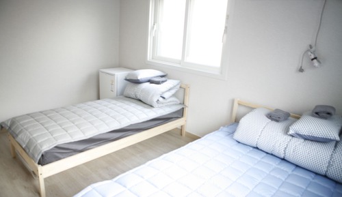 Chambre Deluxe avec lits jumeaux, salle de bains privée