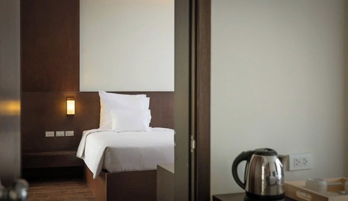 Chambre Deluxe avec lits jumeaux, balcon, vue jardin