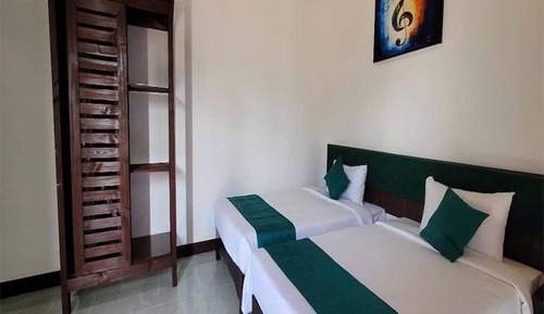 Chambre Supérieure avec lits jumeaux, vue jardin