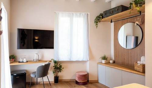 Chambre Deluxe, vue partielle sur la mer