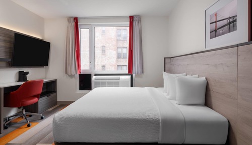 Chambre, 1 très grand lit, non-fumeurs