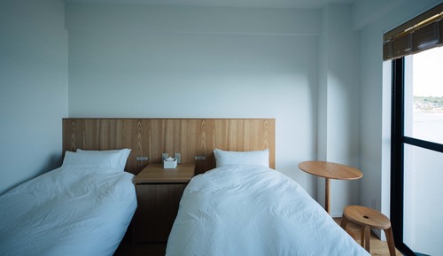 Chambre avec lits jumeaux, vue océan