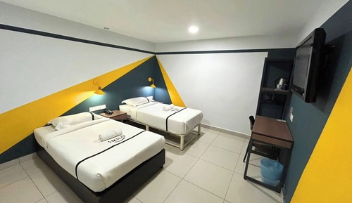 Chambre avec lits jumeaux