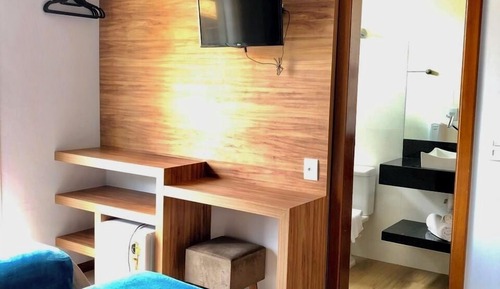 Chambre Triple Classique, véranda, vue ville