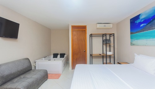 Chambre Double Standard, 1 lit double, bain à remous