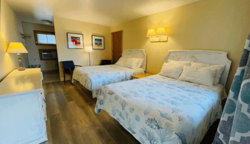 Chambre, plusieurs lits