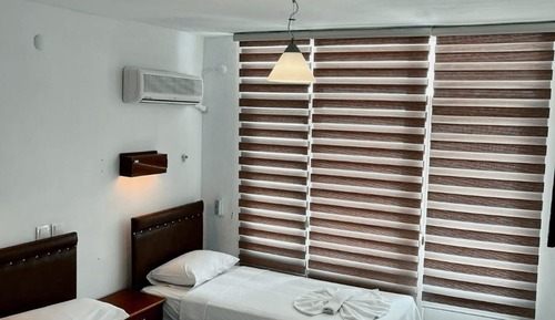 Chambre avec lits jumeaux, balcon, vue mer