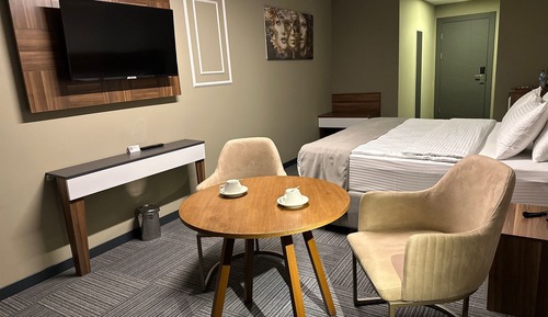 Chambre Premium, vue partielle sur la mer