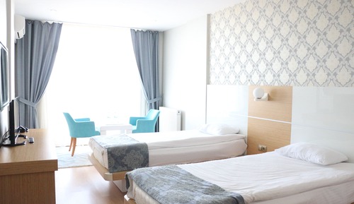 Chambre avec lits jumeaux, vue mer