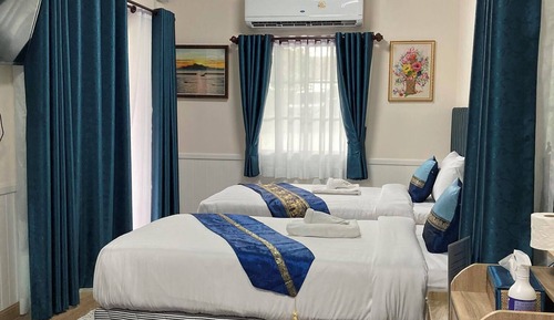 Chambre Deluxe avec lits jumeaux, vue jardin
