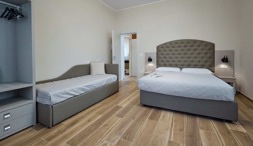 Chambre Quadruple Deluxe, plusieurs lits