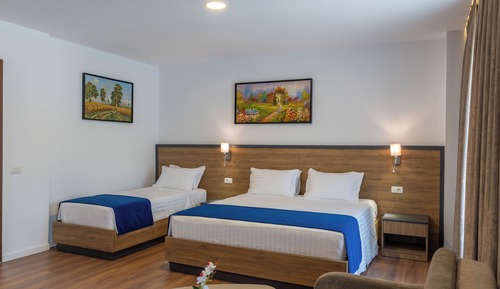 Chambre Triple Deluxe