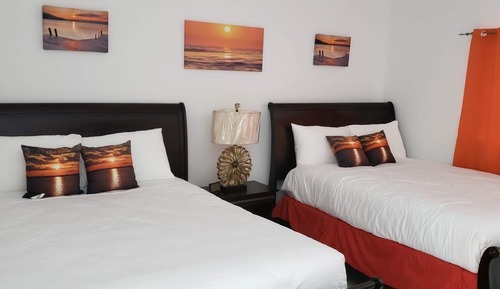 Chambre Double Deluxe, vue partielle sur la mer, en bord de piscine