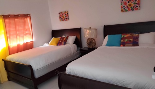 Chambre Double Deluxe, vue partielle sur la mer, en bord de piscine