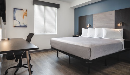 Suite Deluxe, 1 très grand lit et 1 canapé-lit, accessible aux personnes à mobilité réduite