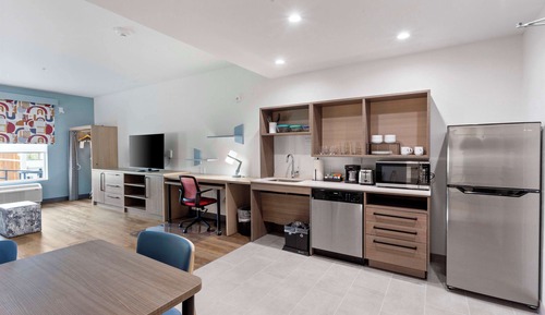 Suite Studio, 2 grands lits, accessible aux personnes à mobilité réduite, baignoire