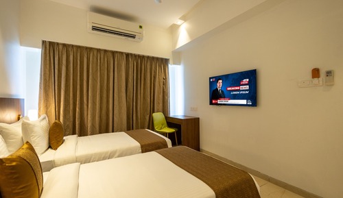 Chambre Exécutive avec lits jumeaux