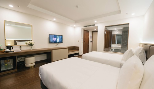 Chambre Luxe Double ou avec lits jumeaux, plusieurs lits