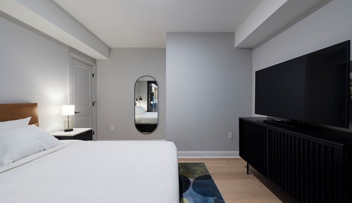 Suite Deluxe, 1 grand lit et 1 canapé-lit, accessible aux personnes à mobilité réduite