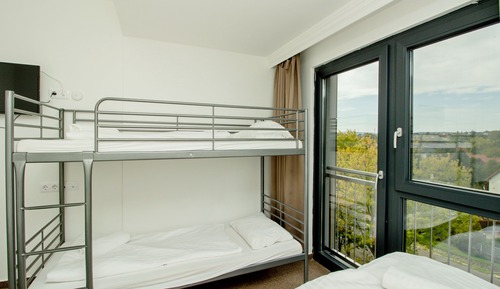 Chambre, vue colline