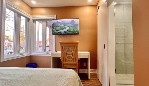 Chambre Confort, 1 grand lit, salle de bains privée