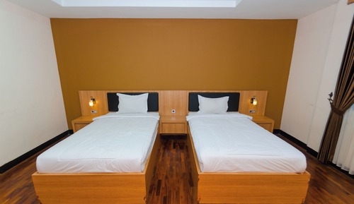 Chambre Exécutive avec lits jumeaux