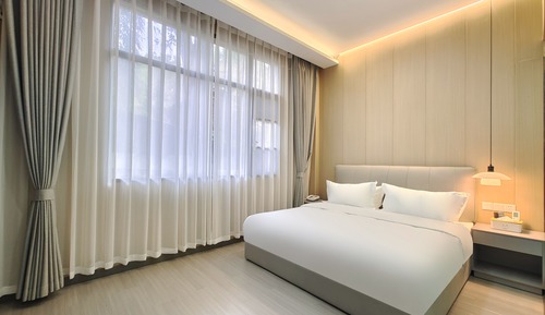 Appartement Économique, 1 grand lit, salle de bains attenante