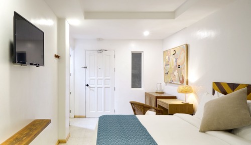 Chambre Deluxe, balcon, vue partielle sur la mer