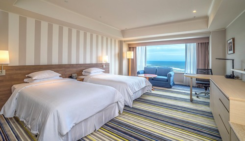 Chambre Deluxe avec lits jumeaux, plusieurs lits, non-fumeurs, vue océan