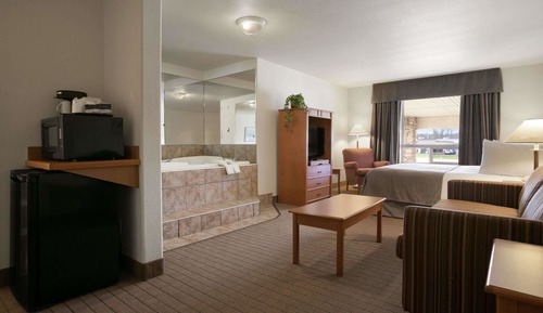Suite, 1 très grand lit, non-fumeurs, bain à remous