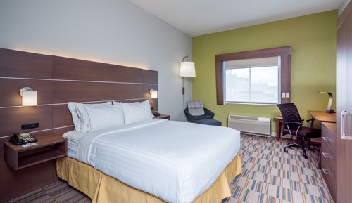 Chambre, 1 grand lit, accessible aux personnes à mobilité réduite (Communications, Roll-In Shower)